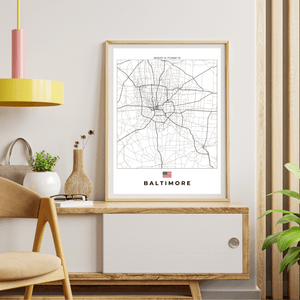 Left view of Baltimore wall artwork map, featuring detailed landscapes and key landmarks in an artistic design.