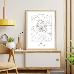 Left view of a Bristol map print, showcasing detailed landmarks and landscapes in a vibrant, artistic design.