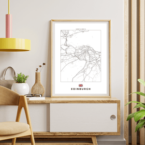 Left view of Edinburgh wall artwork map, featuring detailed landscapes and key landmarks in an artistic design.