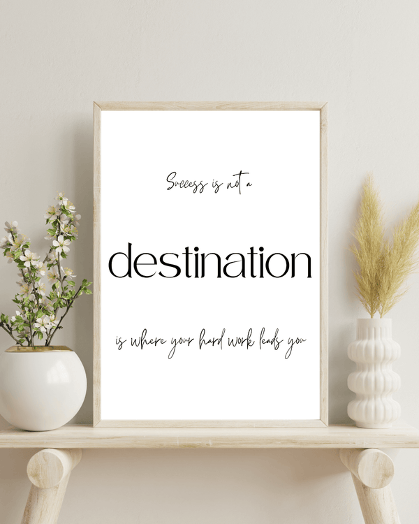 Front view of wall art featuring the quote ' Success is not a destination' in elegant typography of a bed room mockup