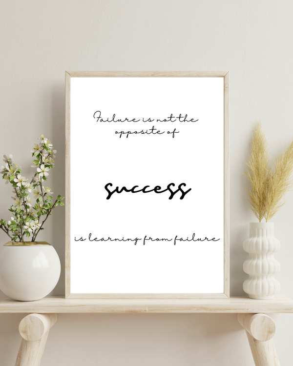 Front view of wall art featuring the quote 'Success is learning from failure' in elegant typography in a living room mockup