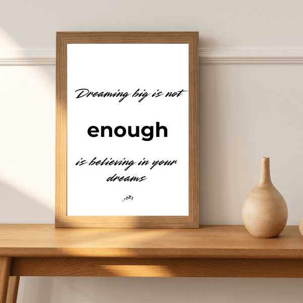 Front view of wall art featuring the quote 'Dreaming big is not enough' in elegant typography in a living room mockup