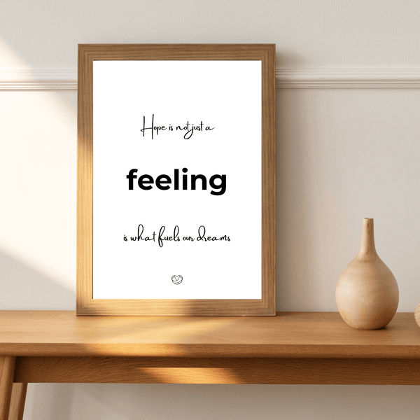 Front view of wall art featuring the quote ' Hope is not just a feeling' in elegant typography of a living room mockup