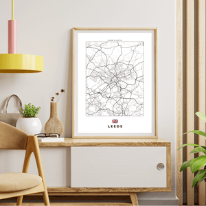 Left view of Leeds wall artwork map, featuring detailed landscapes and key landmarks in an artistic design.