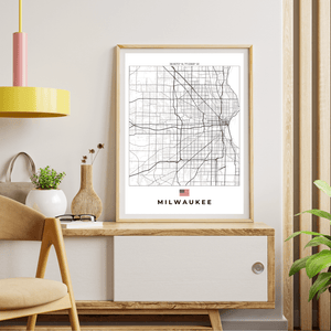 Left view of Milwaukee wall artwork map, featuring detailed landscapes and key landmarks in an artistic design.