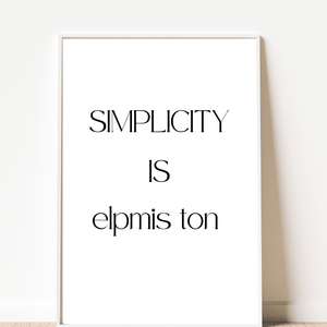 Minimalist wall art displaying the quote 'Simplicity is not simple,' perfect for enhancing your home decor