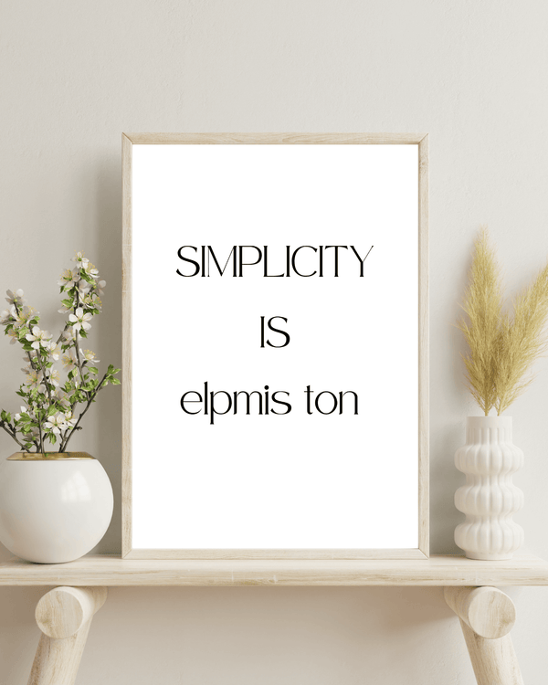  Minimalist wall art displaying the quote 'Simplicity is not simple,' perfect for enhancing your home decor in a bed room mockup