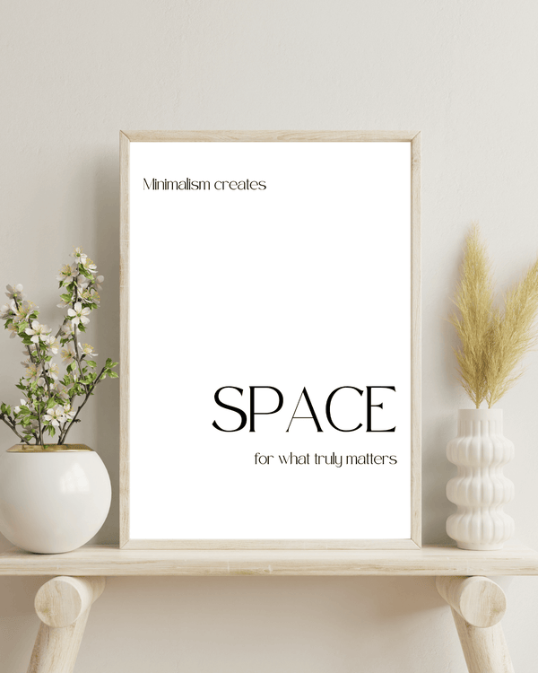 Front view of wall art featuring the quote ' Minimalism creates spaces for what truly matters' in elegant typography of a study room mockup