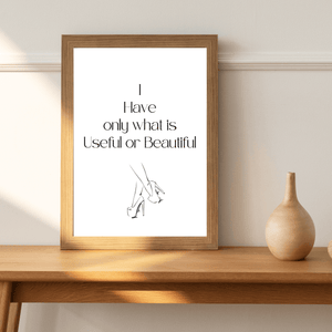 Front view of wall art featuring the quote ' I have only what is useful and beautiful' in elegant typography in a living room mockup