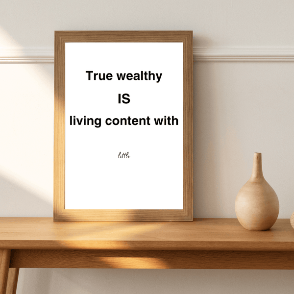 Front view of elegant wall art showcasing the phrase 'True wealthy is living content with little' in a sophisticated design of a living room mockup 