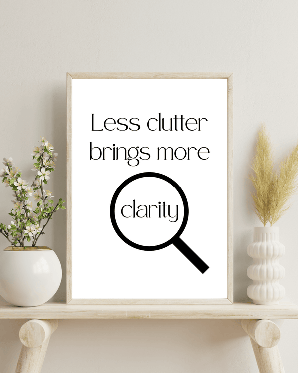 Front view of rtistic representation of the quote 'Less clutter brings more clarity' in a decorative wall print, ideal for inspiration in a bed room mockup