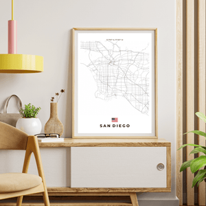 Left view of San Diego wall artwork map, featuring detailed landscapes and key landmarks in an artistic design.